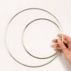 Gold macrame hoops hand