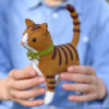 felt tabby cat in hands