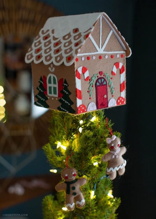 DIY felt gingerbread house on top of a tree