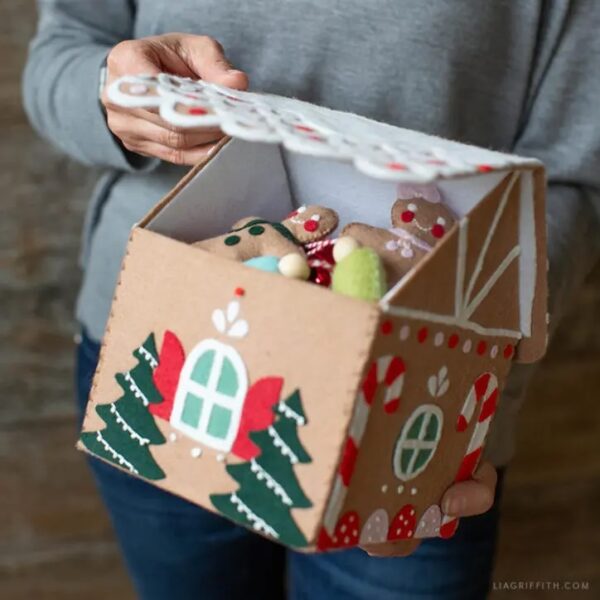 DIY felt gingerbread house open with treats inside