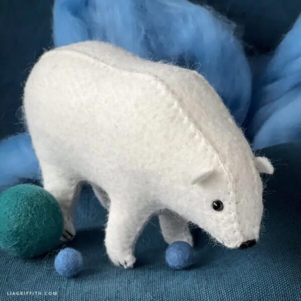 felt polar bear cubs standing